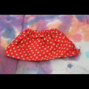 Green and red polka dot skirt